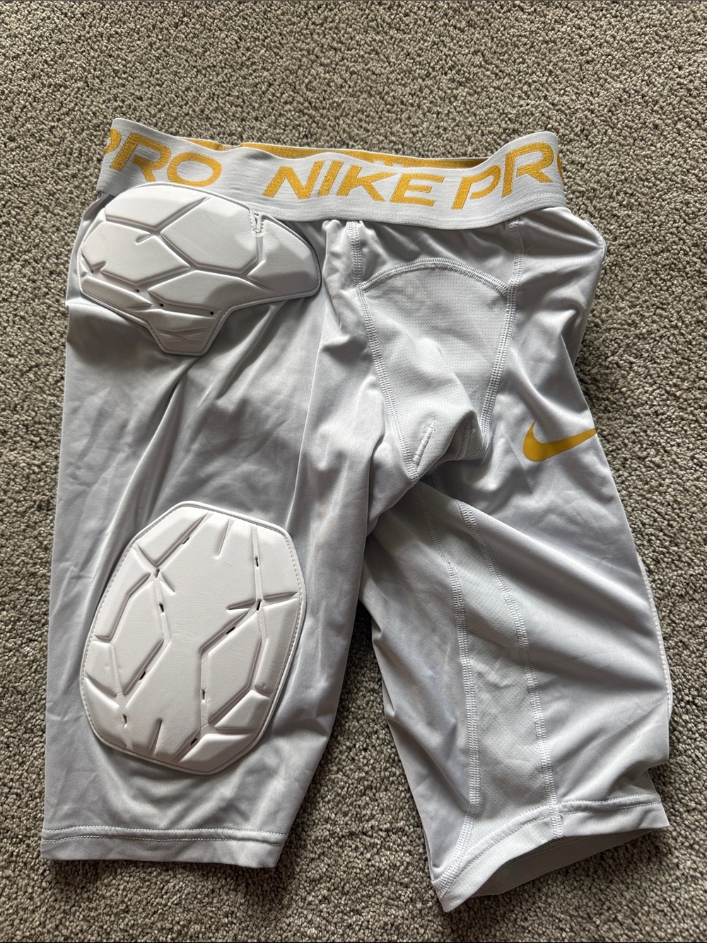 Nike White and Gold men’s small Padded Compression Shorts